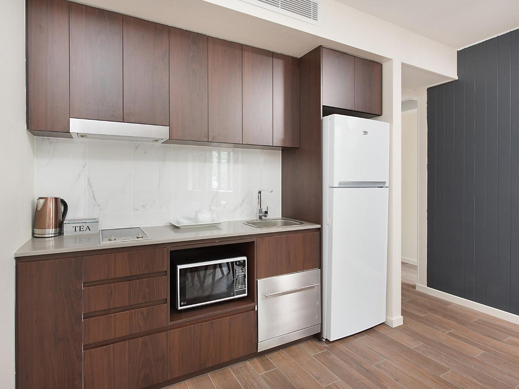Altitude On Montville Pokoj fotografie A typical kitchen in a student apartment